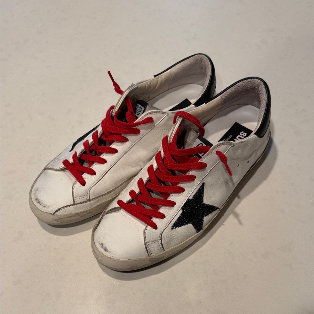 Golden Goose White Sneakers with Black Star and Red Accents